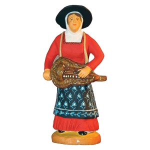 image: Woman playing a traditional instrument