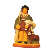 Shepherd with lamb and dog