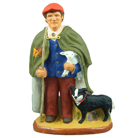 image: Shepherd with lam and dog