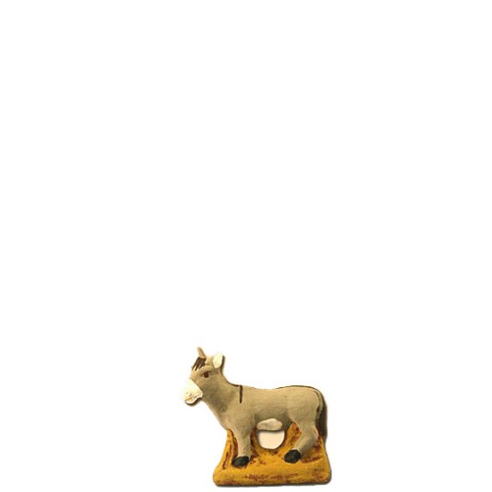 image: Donkey standing on strow