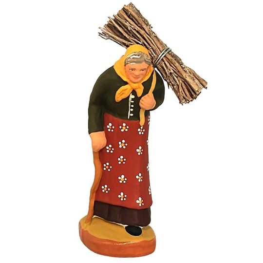 image: Woman carrying a bundle of wood