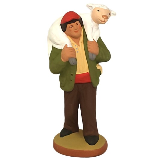 image: Farmhand carrying a sheep