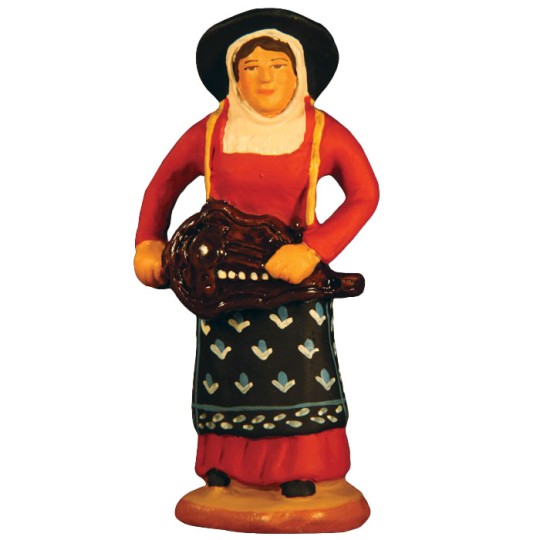 image: Woman playing a traditional instrument